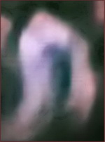 A Faery crystal photographed floating in mid-air the forest